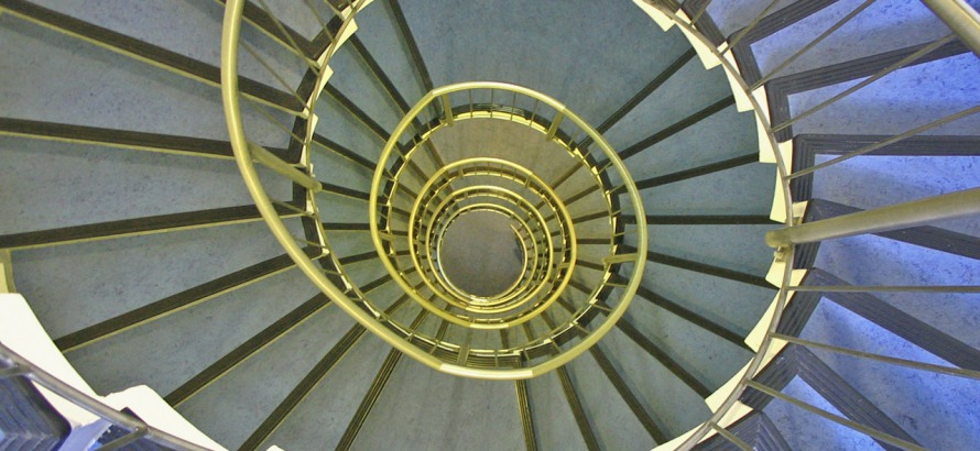 Look downstairs into stairwell whirl by Karl-Ludwig Poggemann_CC BY 2.0