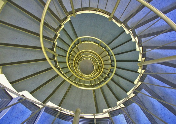 Look downstairs into stairwell whirl by Karl-Ludwig Poggemann_CC BY 2.0